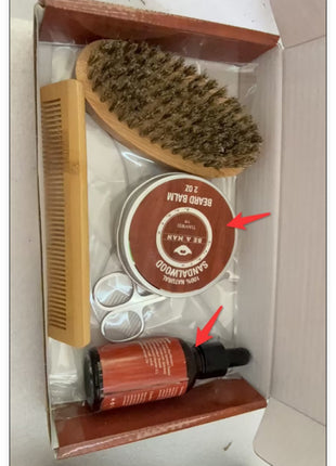 Grooming kit with brush, bottle, and container in a box