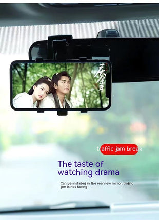 Car rearview mirror with a mounted screen displaying a drama scene, with text indicating it's for traffic jam breaks.