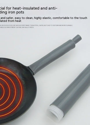 Heat-insulated and anti-scalding iron pot with a gray handle on a white background