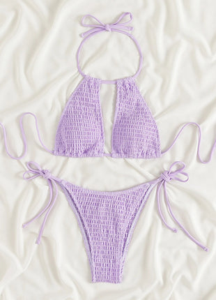 Lavender bikini set on a white background