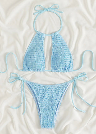 Light blue bikini set on a white background