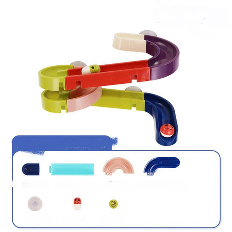 Colorful plastic toy with various components on a white background