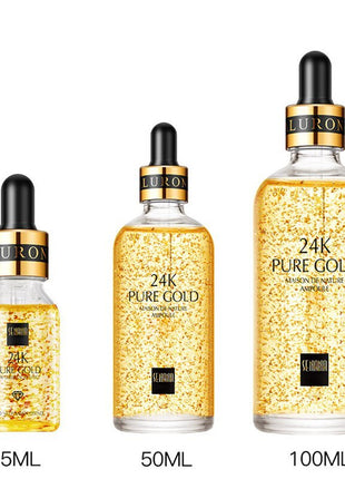 Three bottles of Luron 24K Pure Gold Ampoule in different sizes on a white background.