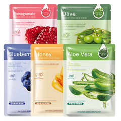 Five skin care mask packages with different ingredients on a white background