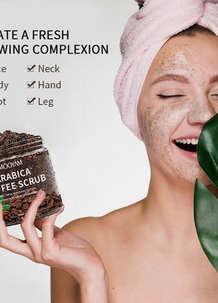 Woman with coffee scrub on face holding a jar of Arabica Coffee Scrub with text about skin care benefits.