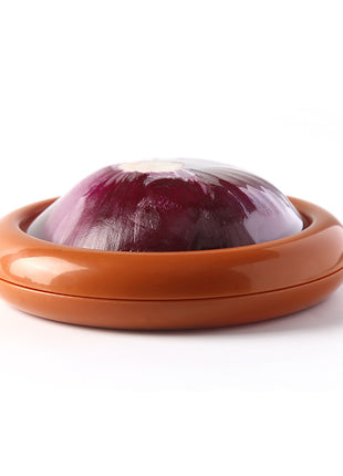 Round, dome-shaped object with a purple center on a white background