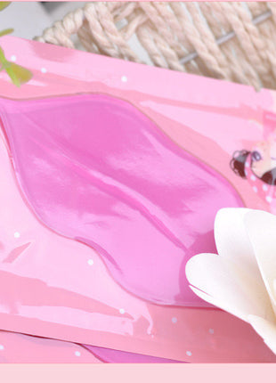 Pink packaging with a white flower on a pink background