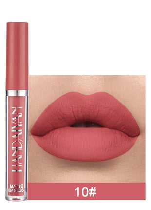 A swatch of a liquid lipstick in a dark red shade, with the product's packaging indicating the shade as '01#'.