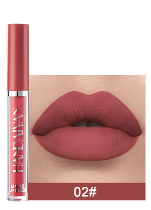 A swatch of a liquid lipstick in a dark red shade, with the product's packaging indicating the shade as '01#'.
