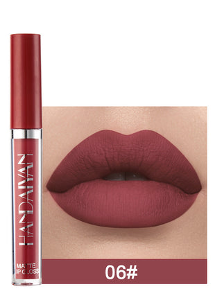 A swatch of a liquid lipstick in a dark red shade, with the product's packaging indicating the shade as '01#'.