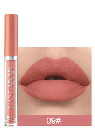 A swatch of a liquid lipstick in a dark red shade, with the product's packaging indicating the shade as '01#'.