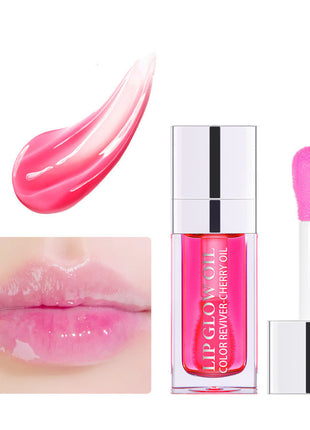 A collection of lip gloss lipsticks in various colors, displayed in clear tubes with silver caps, arranged on a white surface with lighting that creates reflections and highlights.