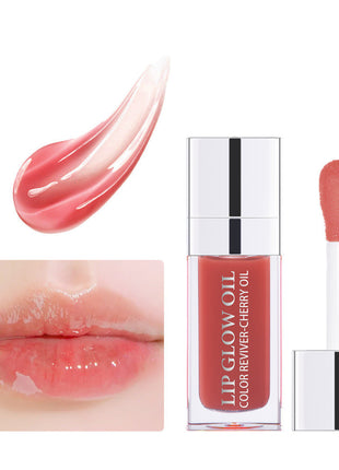 A collection of lip gloss lipsticks in various colors, displayed in clear tubes with silver caps, arranged on a white surface with lighting that creates reflections and highlights.