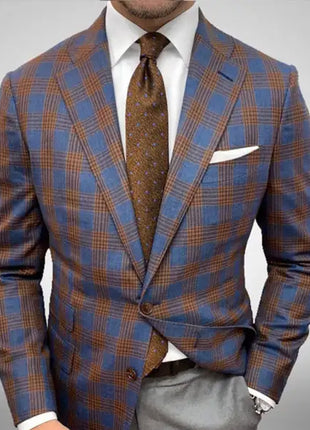 Plaid suit jacket with brown tie and pocket square on a gray background