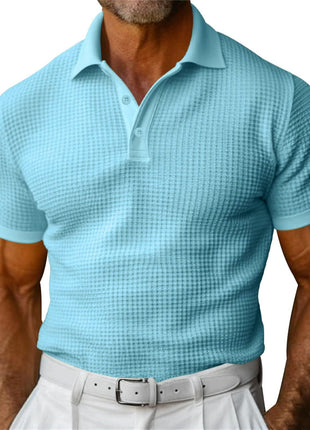 Light blue checkered polo shirt worn by a person on a white background