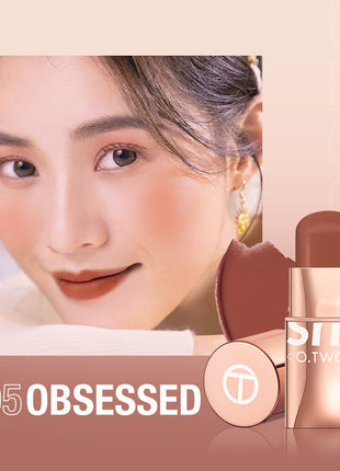 A close-up image of a person with a pink blush on their cheeks, alongside a stick blush labeled 'O.TWO.