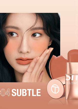 A close-up image of a person with a pink blush on their cheeks, alongside a stick blush labeled 'O.TWO.