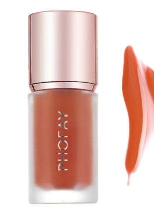 A bottle of PHOFAY Mousse Liquid Blush in pink color with a rose gold cap, alongside a swatch of the product showing its color and texture.