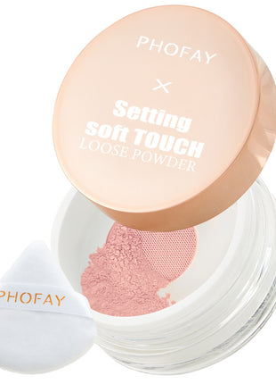 A jar of PHOFAY Setting Soft Touch Loose Powder with a pink lid, alongside a white puff dispenser with the brand name PHOFAY printed on it.