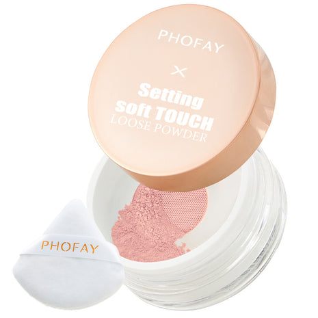 A jar of PHOFAY Setting Soft Touch Loose Powder with a pink lid, alongside a white puff dispenser with the brand name PHOFAY printed on it.