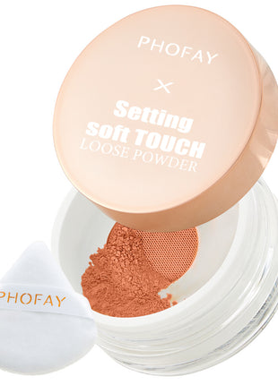 A jar of PHOFAY Setting Soft Touch Loose Powder with a pink lid, alongside a white puff dispenser with the brand name PHOFAY printed on it.