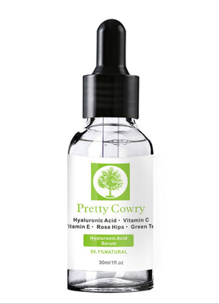 Pretty Cowry skincare serum bottle with dropper on a white background