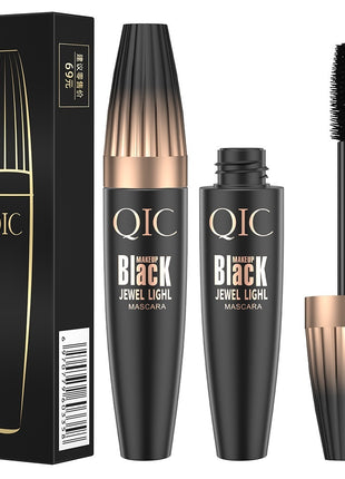 QIC mascara with packaging on a white background
