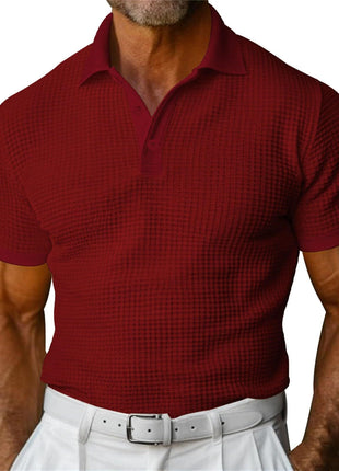 Red checkered polo shirt worn by a person on a white background