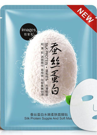 Silk protein face mask packaging with a white mask on a light blue background