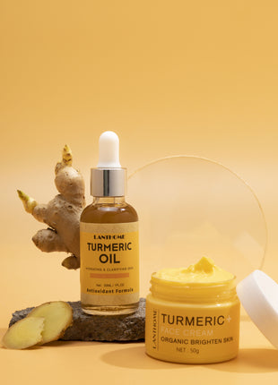 Turmeric oil bottle and cream jar with a yellow background