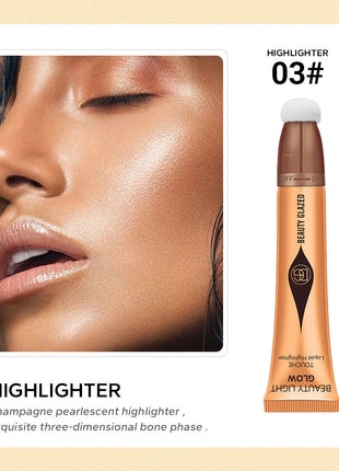 An image showcasing various beauty products including a highlighter, contour cream, and blusher. The highlighter is in a gold tube, the contour cream in a rose gold tube, and the blusher in a pink tube, each with a small sample amount applied to the skin to demonstrate the effect.