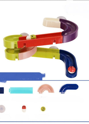 Colorful plastic toy with various components on a white background