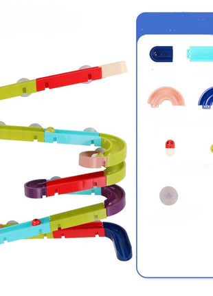 Colorful toy track set with a smartphone displaying a virtual version of the track.