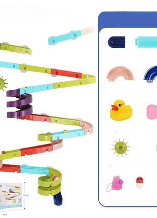 Colorful marble run toy set with additional parts on a white background
