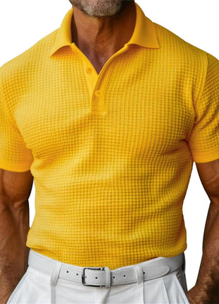 Man wearing a yellow checkered polo shirt on a white background
